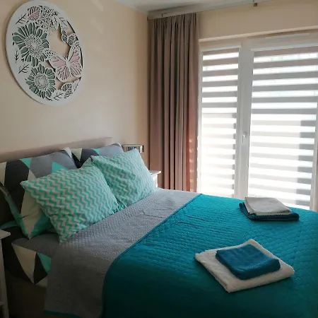 Piaskowy De Lux Daire *